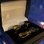 Cufflinks and tie clip in black box