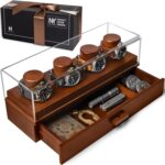 Wooden watch winder display holding four watches