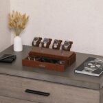 Brown leather watch box with four watches