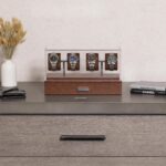 Four luxury watches in wooden display case