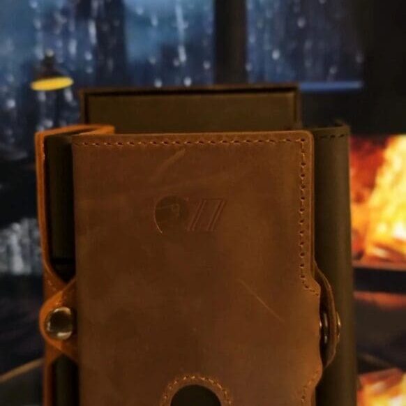 Leather case with cozy fireplace background
